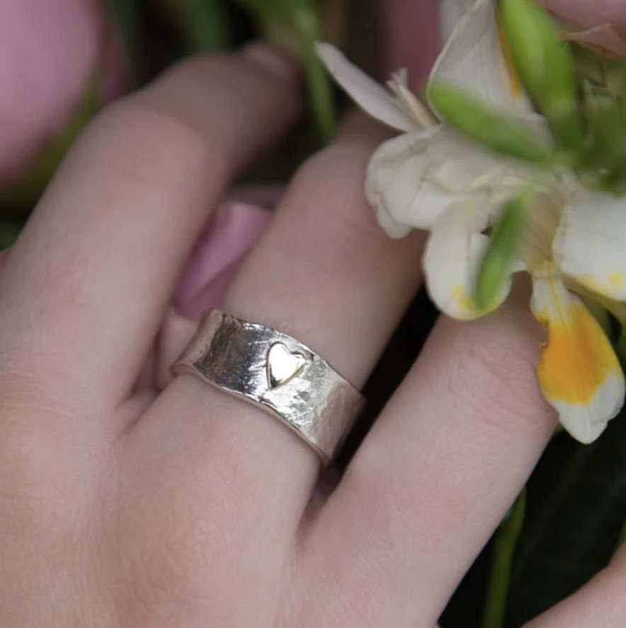 Silver ring with new arrivals gold heart